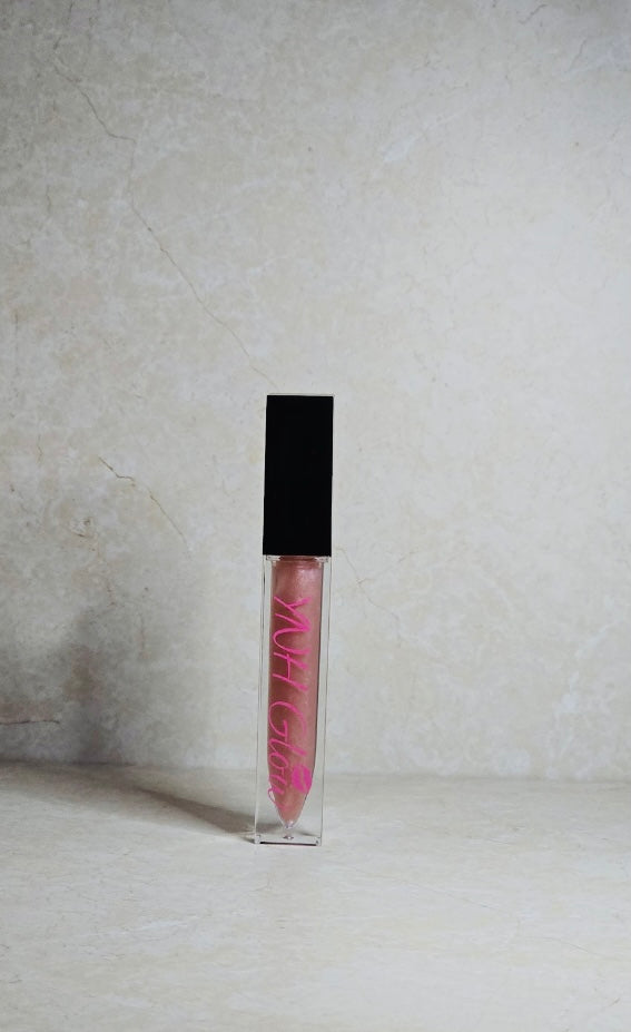 Minkey Promise Lip Gloss by YNH Glow - Light rose gold lip gloss in a chic tube, with a soft, metallic shimmer and a warm, pink-gold tint for a glossy, radiant finish.